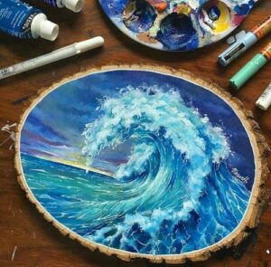 paintings on wood slices at paint n hang arts and crafts